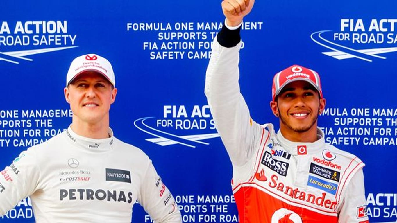 Michael Schumacher und Lewis Hamilton beim Großen Preis von Malaysia im Jahr 2012.