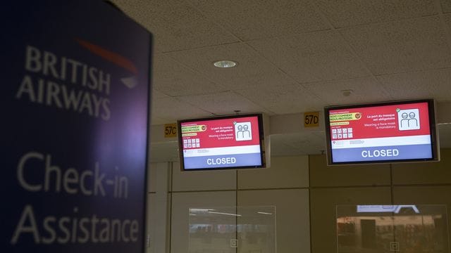 Ein geschlossener British-Airways-Schalter am Flughafen von Genf (Schweiz). Ein geschlossener British-Airways-Schalter am Flughafen von Genf (Schweiz).