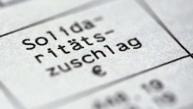 Der Solidaritätszuschlag ist für viele Beschäftigte seit Anfang 2021 Geschichte.