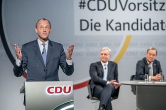 Friedrich Merz (l) versichert im Fall seiner Wahl zum CDU-Chef, einen Bruch mit der Ära Merkel verhindern zu wollen.