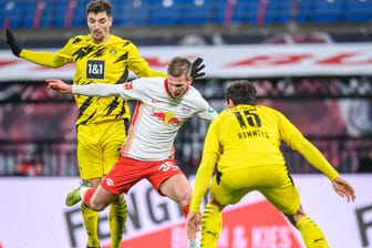 Die Bayern-Verfolger: RB Leipzig und Dortmund – hier ein Zweikampf zwischen Hummels vom BVB und RBs Olmo (Mi.) – wollen Im Rennen um die Meisterschaft noch mitspielen.