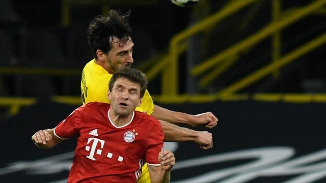Die Sommerspiele 2021 in Tokio finden ohne den ehemaligen Fußball-Weltmeister Thomas Müller (vorn, im Duell mit Mats Hummels) statt. Die Sommerspiele 2021 in Tokio finden ohne den ehemaligen Fußball-Weltmeister Thomas Müller (vorn, im Duell mit Mats Hummels) statt.
