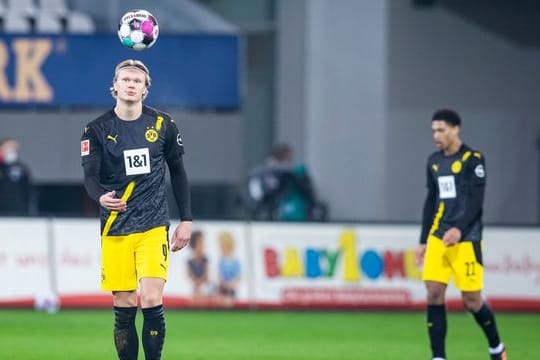 Erling Haaland (l) und der BVB unterlagen in Freiburg.