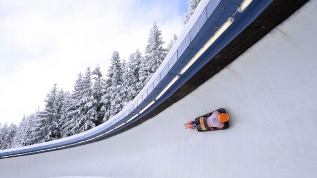 Skeleton-Pilotin Tina Hermann im Eiskanal von Altenberg auf dem Weg zum WM-Einzel-Gold. Skeleton-Pilotin Tina Hermann im Eiskanal von Altenberg auf dem Weg zum WM-Einzel-Gold.