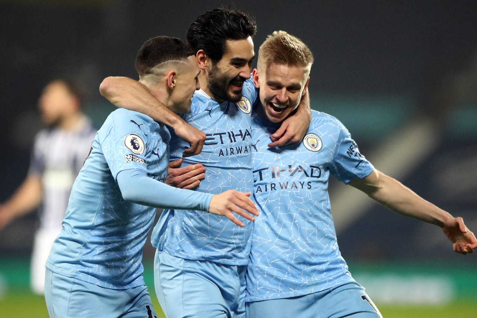 Alexander Zinchenko, Ilkay Gündogan und Phil Foden (v.l.n.r.): Der deutsche Mittelfeldstratege jubelt mit seinen Teamkollegen.