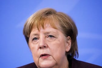 "Wir stellen uns denen, die versuchen, Deutschland zu spalten, mit aller Kraft und Entschlossenheit entgegen": Angela Merkel.