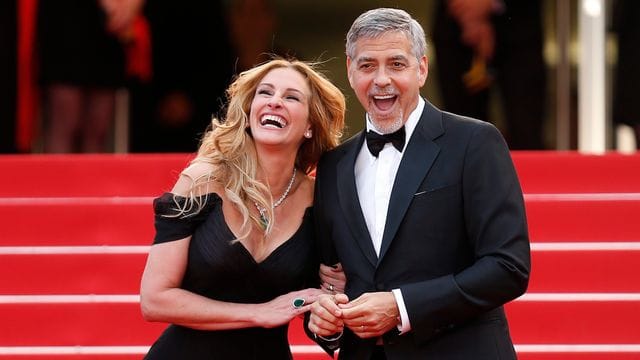 Die US-Schauspieler Julia Roberts und George Clooney stehen gemeinsam vor der Kamera - als Ex-Eheleute.