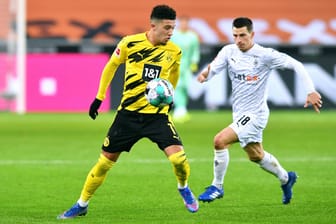 Dortmund und Jadon Sancho (l.) müssen gegen Stefan Lainer und Mönchengladbach im Viertelfinale des DFB-Pokals ran.