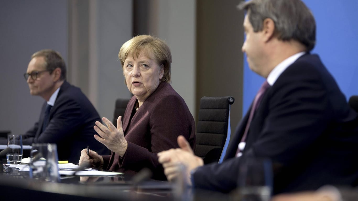 Michael Müller, Angela Merkel und Markus Söder werden heute Abend wieder die neuen Corona-Regeln verkünden.