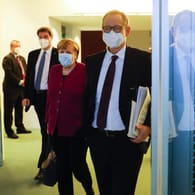 Angela Merkel, Markus Söder und Michael Müller: Der Bund-Länder-Gipfel hat einen Plan mit fünf Stufen beschlossen.