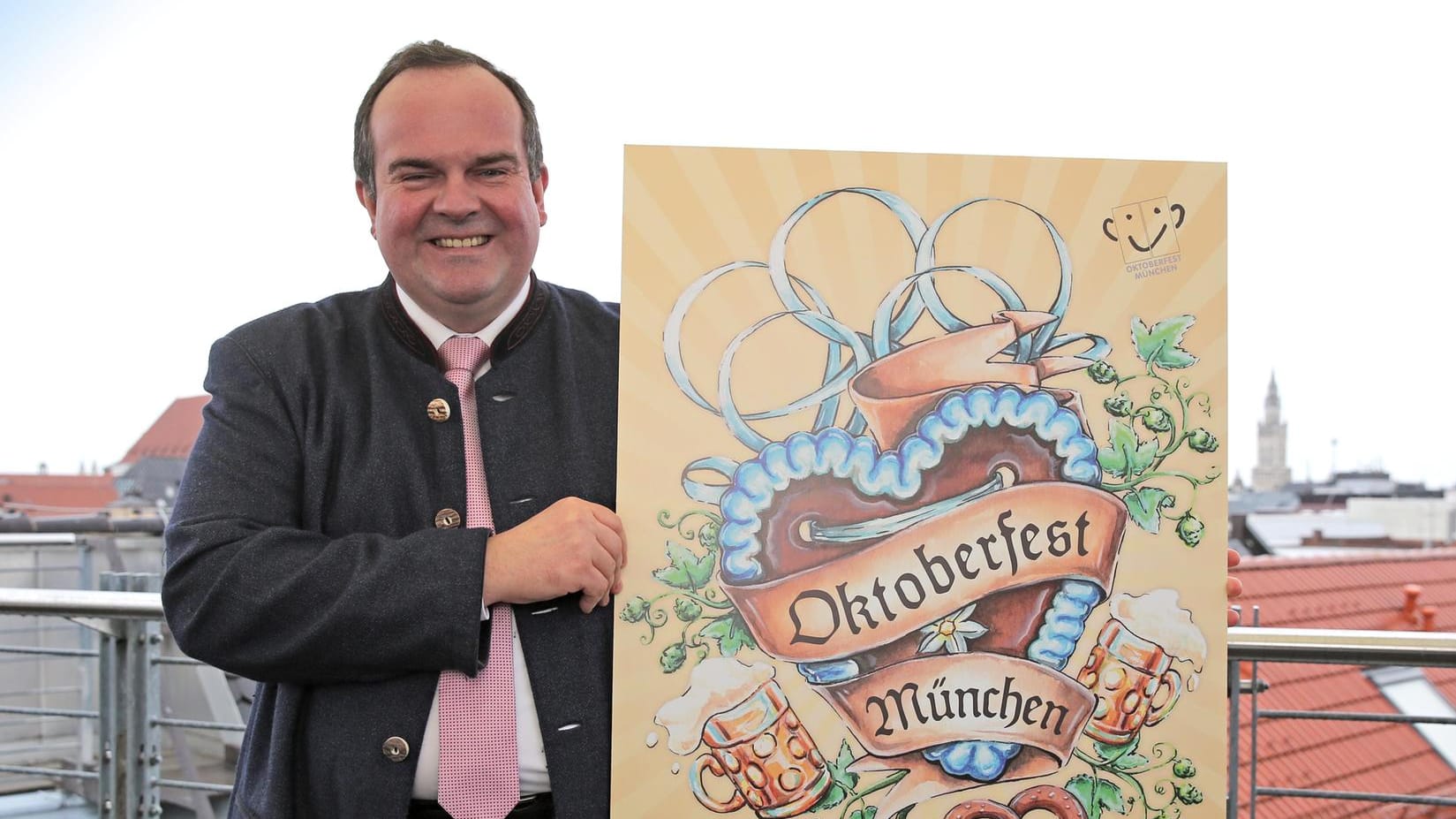 Clemens Baumgärtner mit dem diesjährigen Wiesn-Plakat: Die Vorstellung dessen sorgte zunächst für Unmut.