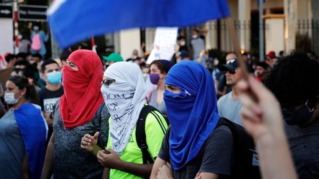 Demonstranten protestieren gegen den Zustand des öffentlichen Gesundheitssystems in Paraguay.