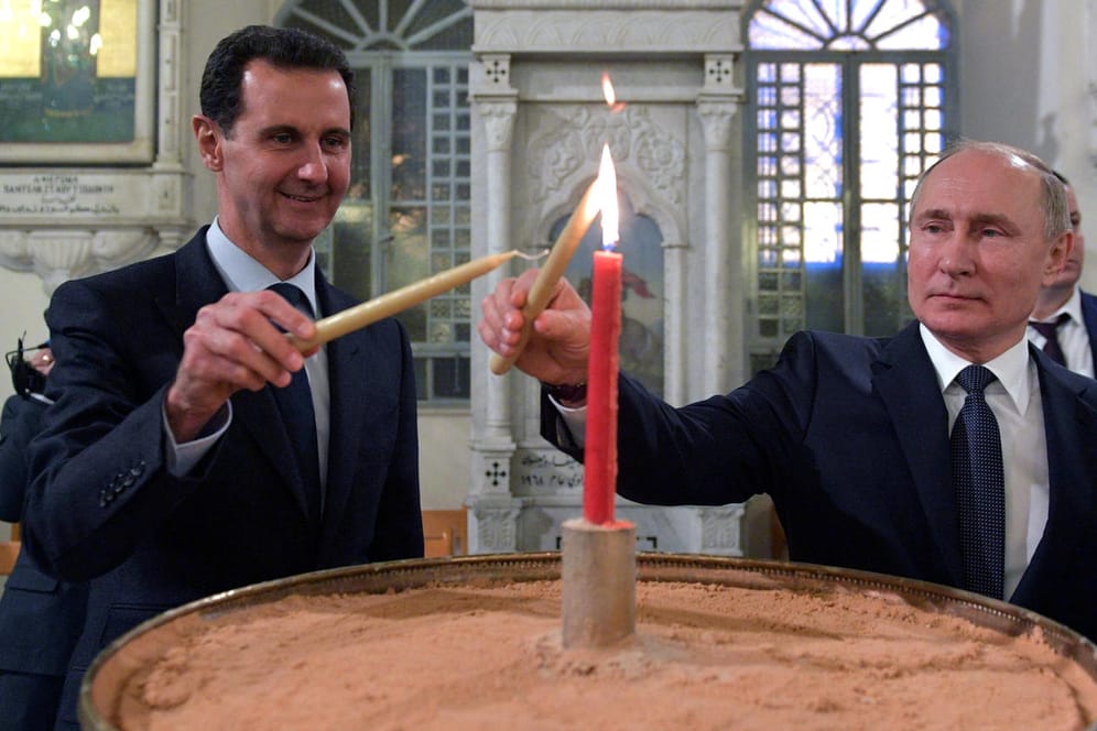 Damaskus am 7. Januar 2020: Baschar al-Assad und der russische Präsident Wladimir Putin nehmen an einem christlich-orthodoxen Gottesdienst teil.