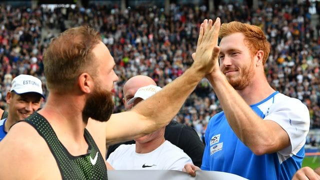 Die Brüder Robert (l) und Christoph Harting haben sich wieder angenähert.