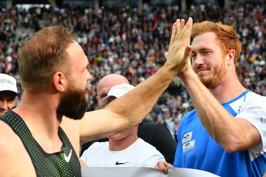 Die Brüder Robert (l) und Christoph Harting haben sich wieder angenähert.