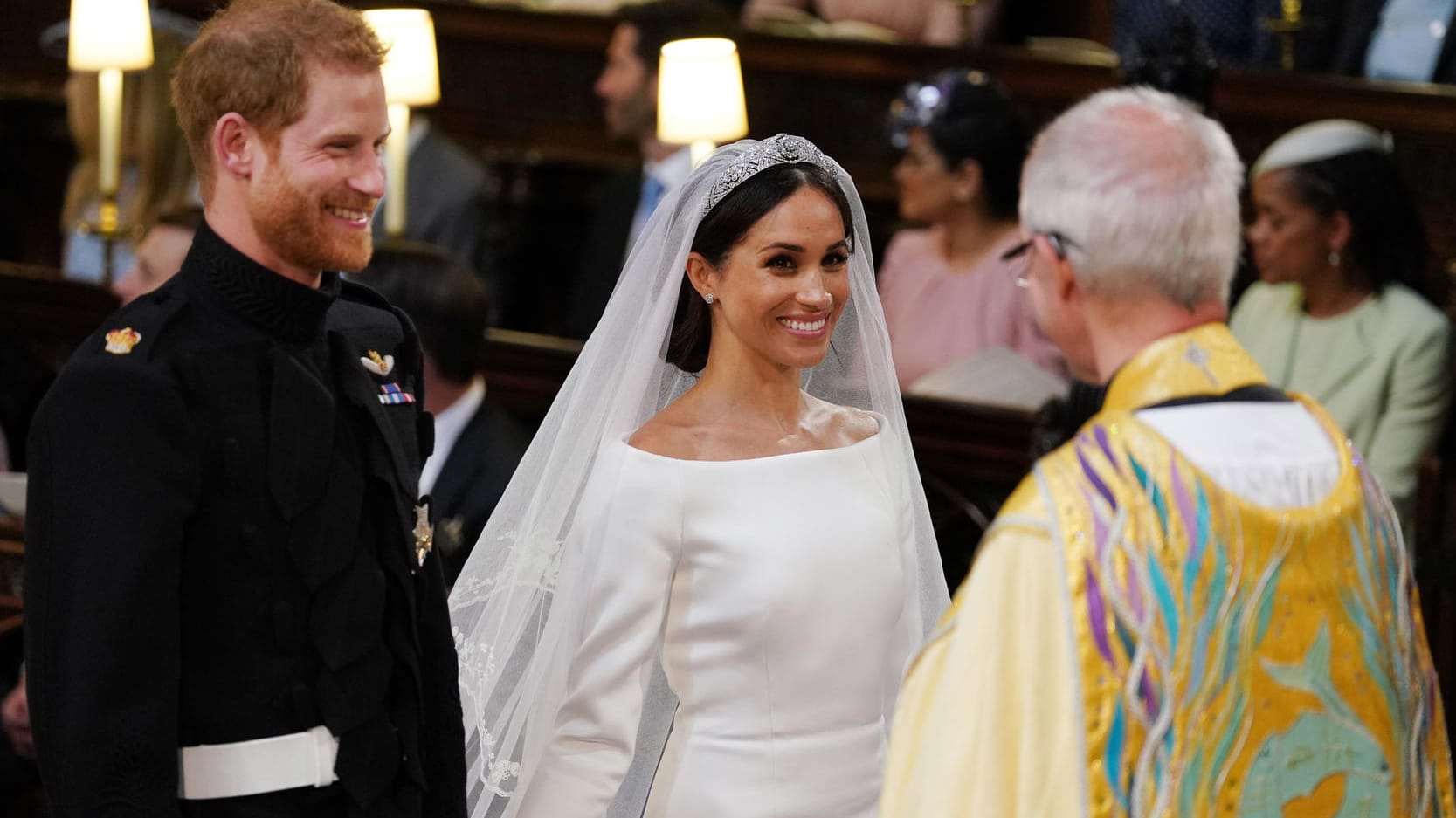 Prinz Harry und Herzogin Meghan während ihrer Hochzeit am 19. Mai 2018 in Windsor: Vor ihnen steht der Erzbischof von Canterbury, Justin Welby. Prinz Harry und Herzogin Meghan während ihrer Hochzeit am 19. Mai 2018 in Windsor: Vor ihnen steht der Erzbischof von Canterbury, Justin Welby.