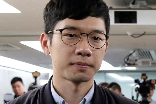 Der pro-demokratische Aktivist Nathan Law erhält Asyl in Großbritannien.