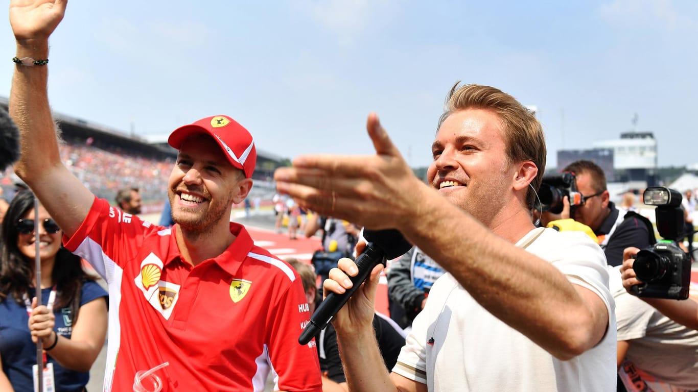 Sebastian Vettel und Nico Rosberg (r.): Der ehemalige Weltmeister Rosberg glaubt an ein Ende der Vettel-Krise.