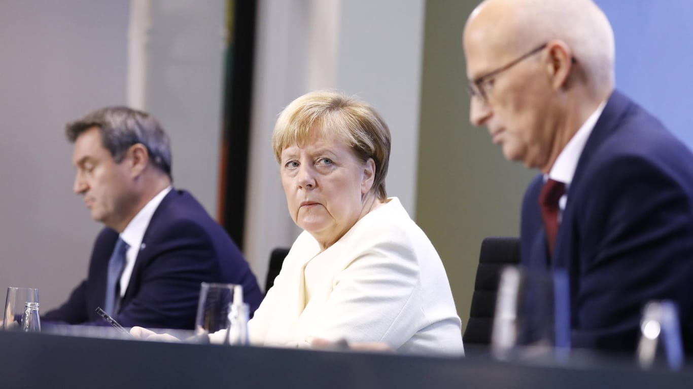 Vorerst gescheitert: Angela Merkel (CDU), Markus Söder (CSU) und Peter Tschentscher (SPD) nach einer Ministerpräsidentenkonferenz