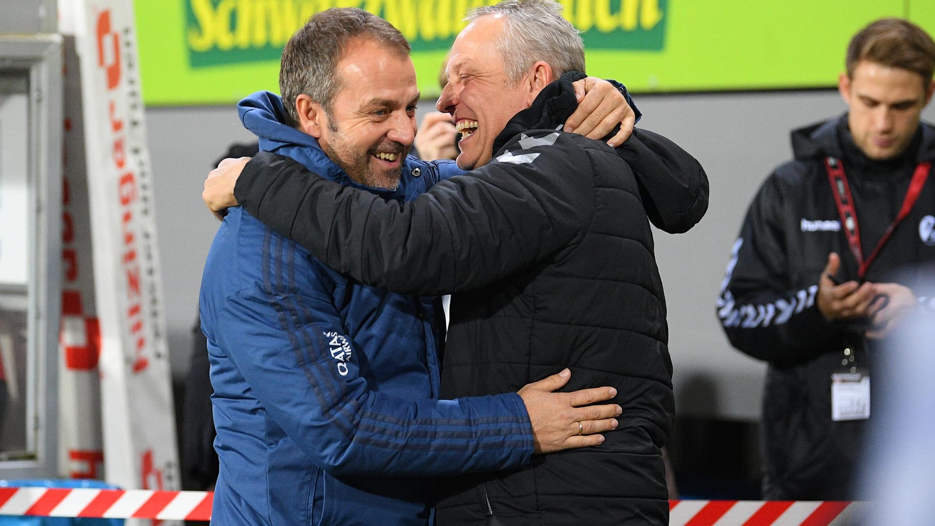 Gegenseitige Wertschätzung: Flick (l.) und Freiburgs Trainer Streich.