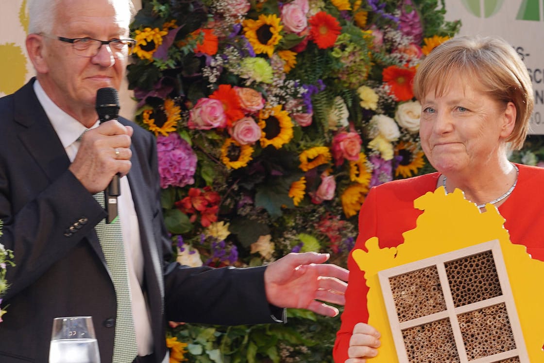 Winfried Kretschmann und Angela Merkel in der Landesvertretung Baden-Württemberg 2018: "Sie ist in der Pandemie noch mal zu Hochform aufgelaufen."