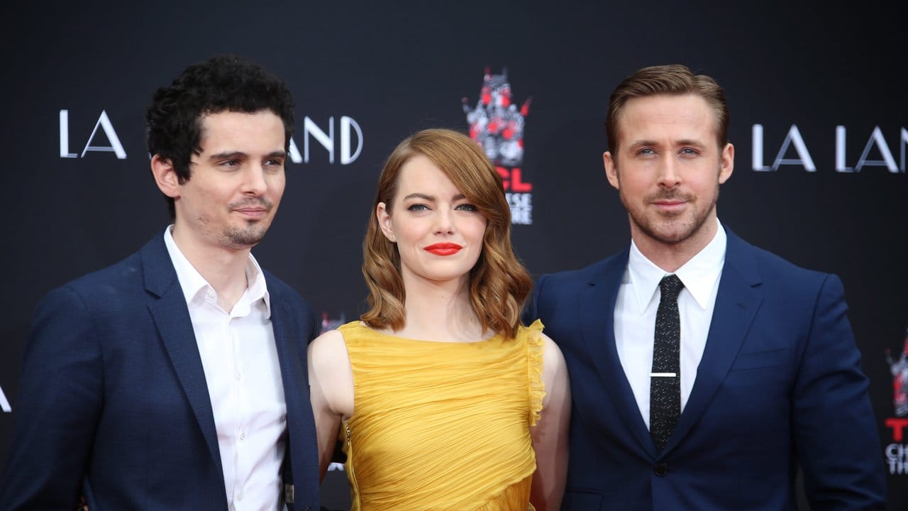 Regisseur Damien Chazelle (l), Emma Stone und Ryan Gosling gelang mit der Musical-Romanze "La La Land" ein Volltreffer.