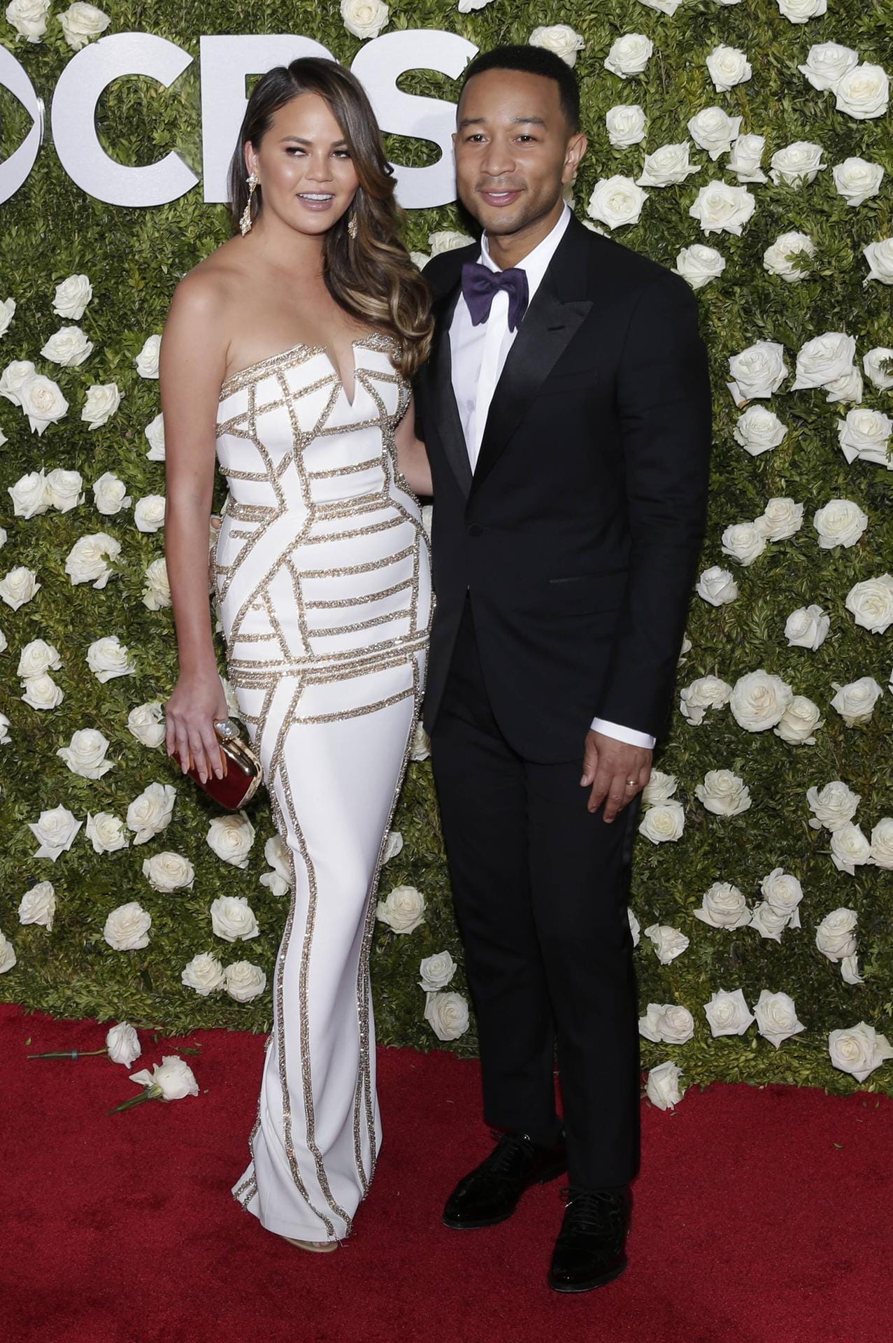 Chrissy Teigen and John Legend arrive on the red carpet at the 71st Annual Tony Awards at Radio City