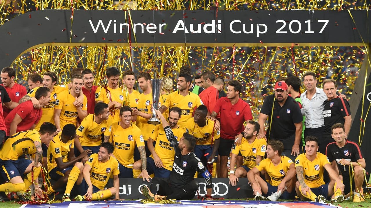 Die Spieler von Atletico Madrid freuen sich über den Sieg. Die Spieler von Atletico Madrid freuen sich über den Sieg.