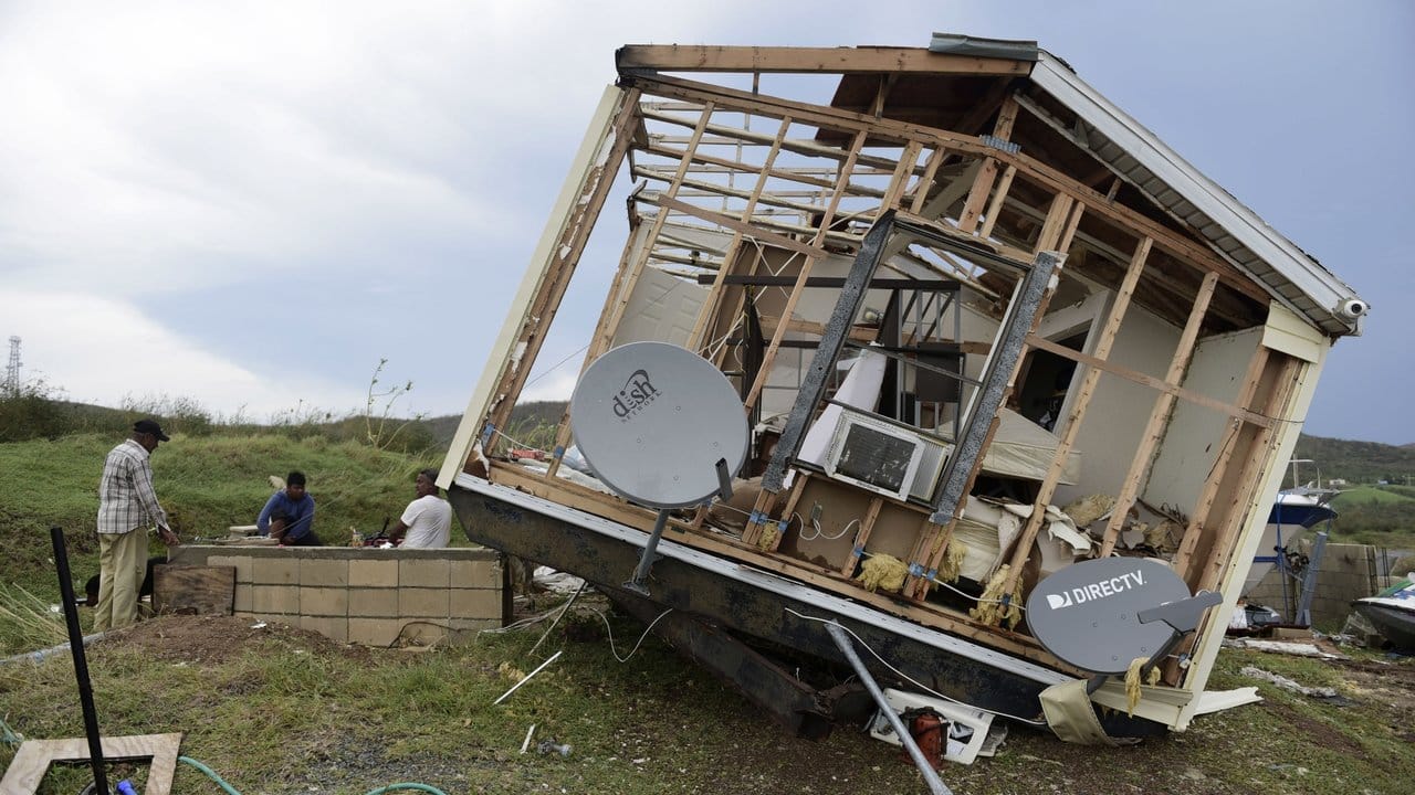 Ein von Hurrikan "Irma" schwer beschädigtes Haus in Puerto Rico. Ein von Hurrikan "Irma" schwer beschädigtes Haus in Puerto Rico.