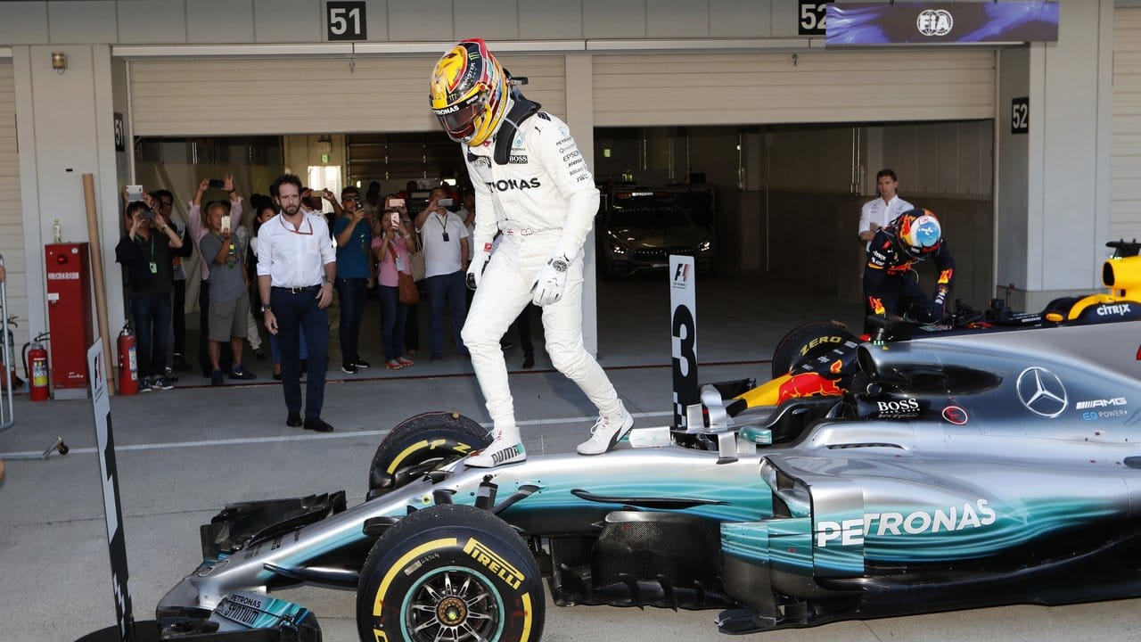 Lewis Hamilton und sein Sieger-Auto.