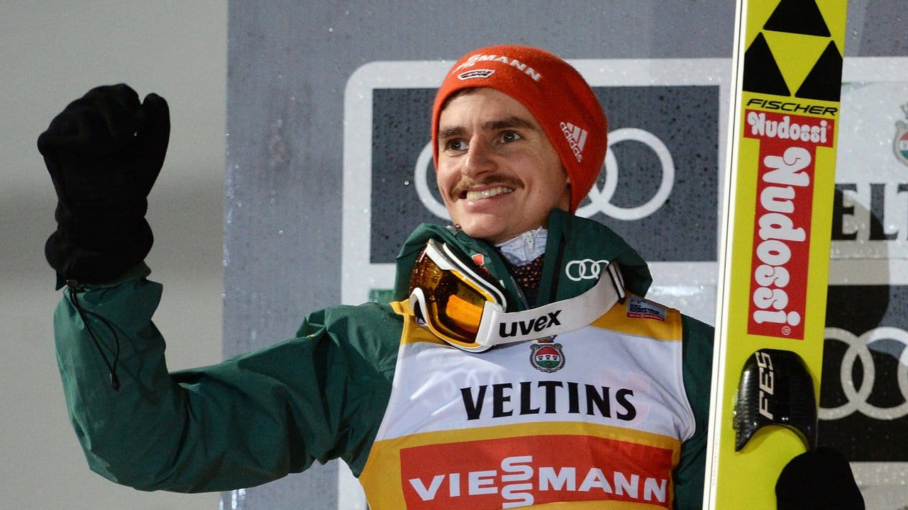 Richard Freitag aus Deutschland jubelt über seinen zweiten Platz zum Auftakt der Vierschanzentournee. Richard Freitag aus Deutschland jubelt über seinen zweiten Platz zum Auftakt der Vierschanzentournee.