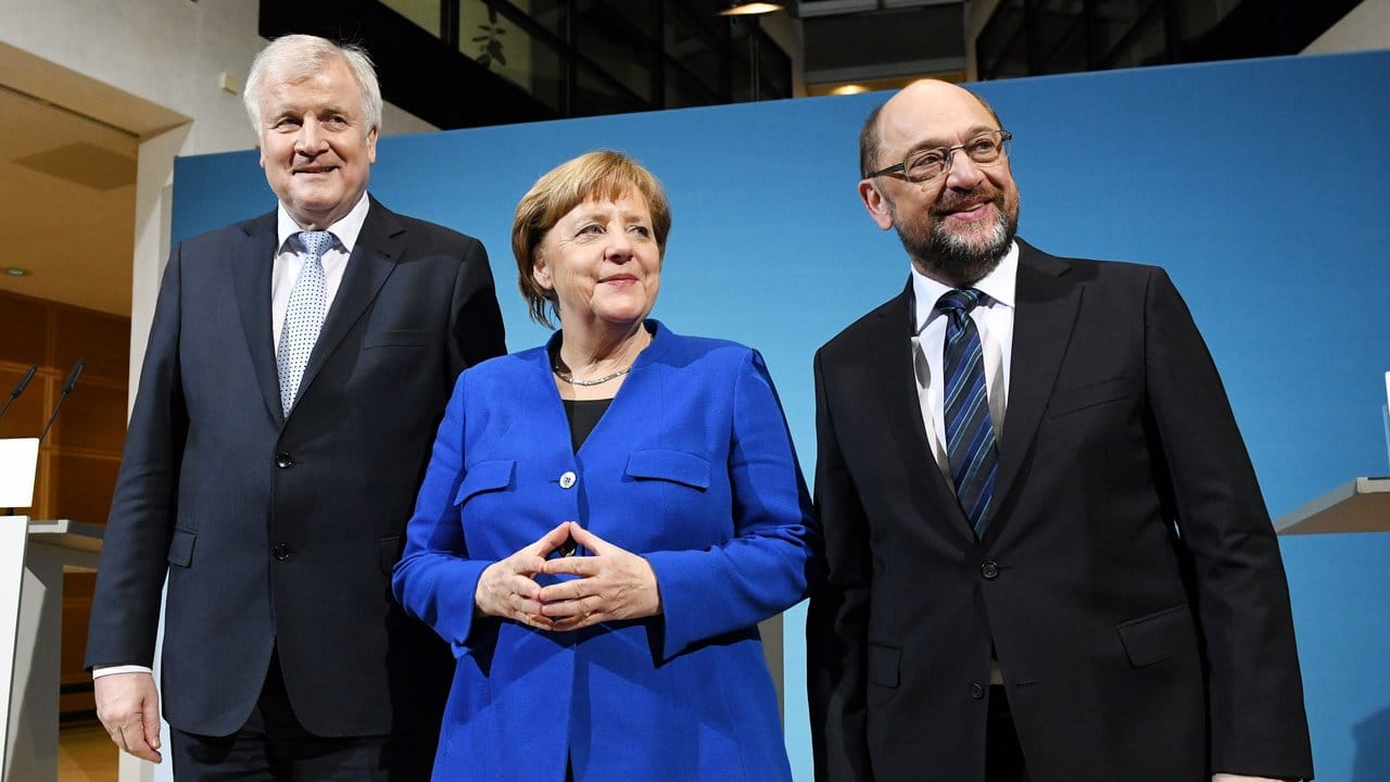 Horst Seehofer (l), Martin Schulz (r) und Angela Merkel (CDU) im Willy-Brandt-Haus in Berlin.