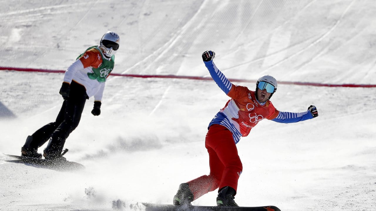 Pierre Vaultier (r) ist der alte und neue Olympiasieger im Snowboardcross.