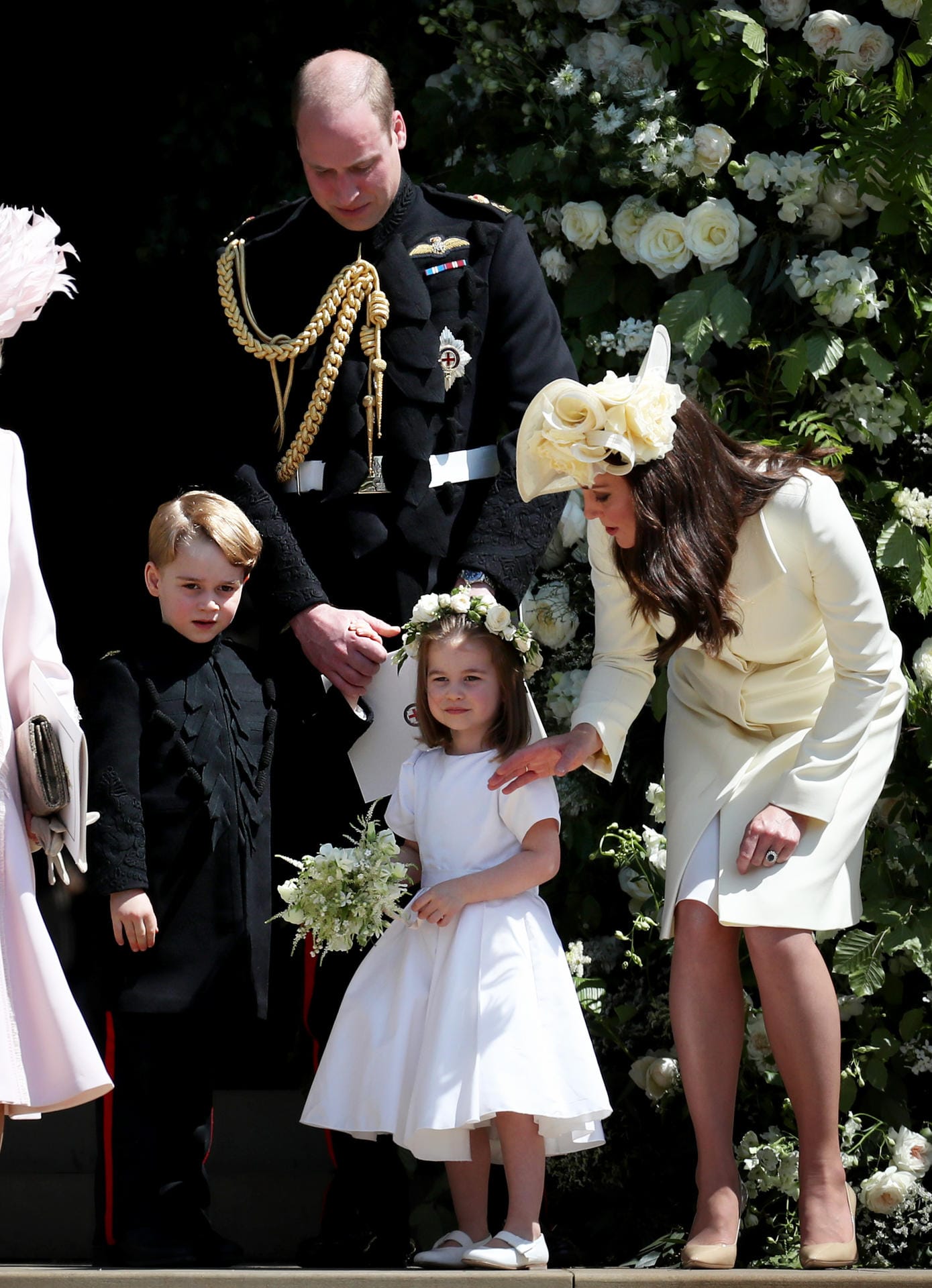Prinz Louis bleibt zu Hause: William, Kate, George und Charlotte bei der Hochzeit von Meghan und Harry am 19. Mai 2018.