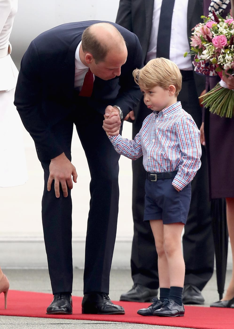 Selber Tag, andere Miene: Prinz George scheint nicht so begeistert.