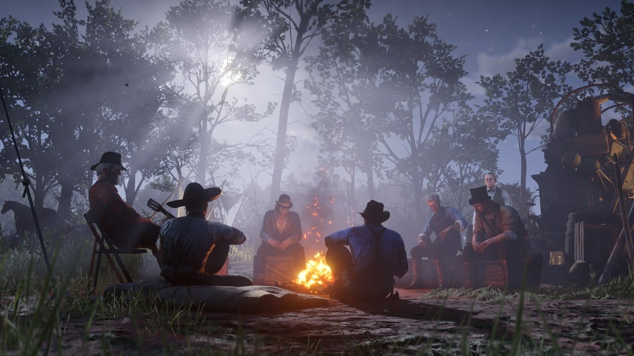 Männerabend: Auch ruhige Momente wie etwa am Lagerfeuer des Camps gibt es in "Red Dead Redemption 2". Männerabend: Auch ruhige Momente wie etwa am Lagerfeuer des Camps gibt es in "Red Dead Redemption 2".