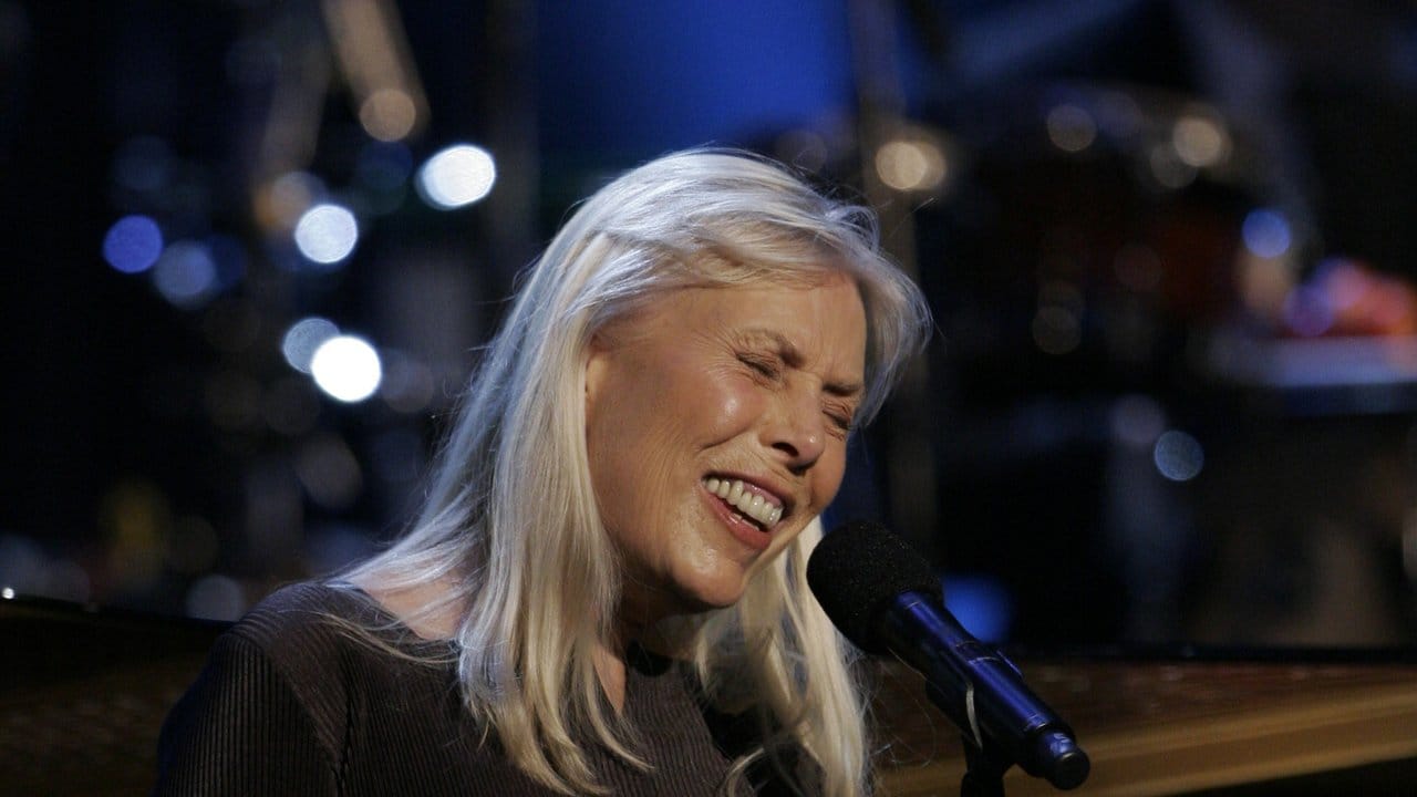 Joni Mitchell bei einem All-Star-Tribute-Konzert für Herbie Hancock (2007). Joni Mitchell bei einem All-Star-Tribute-Konzert für Herbie Hancock (2007).