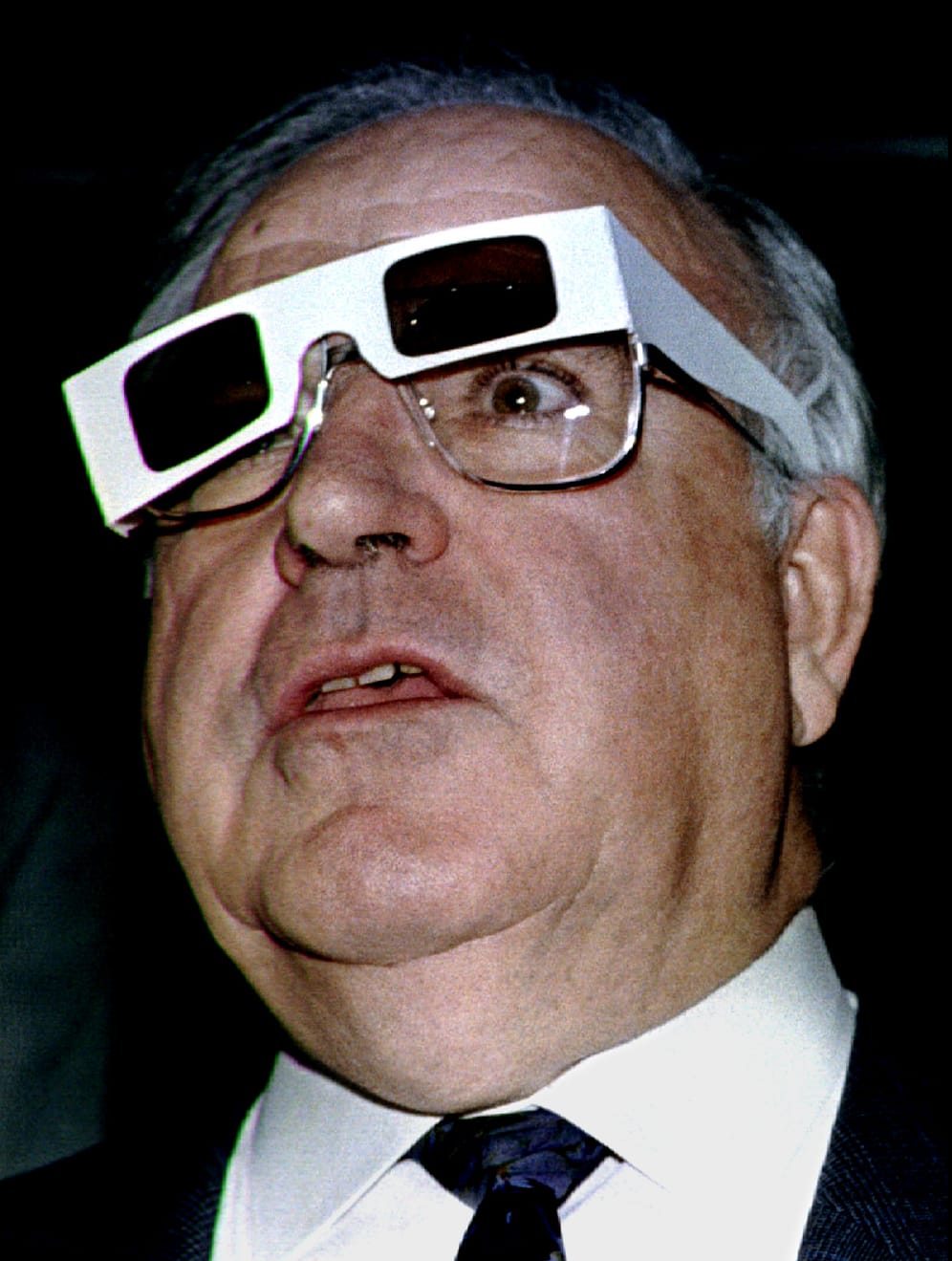 German Chancellor Helmut Kohl wears 3-D glasses to watch a three-dimensional computer performance wh..