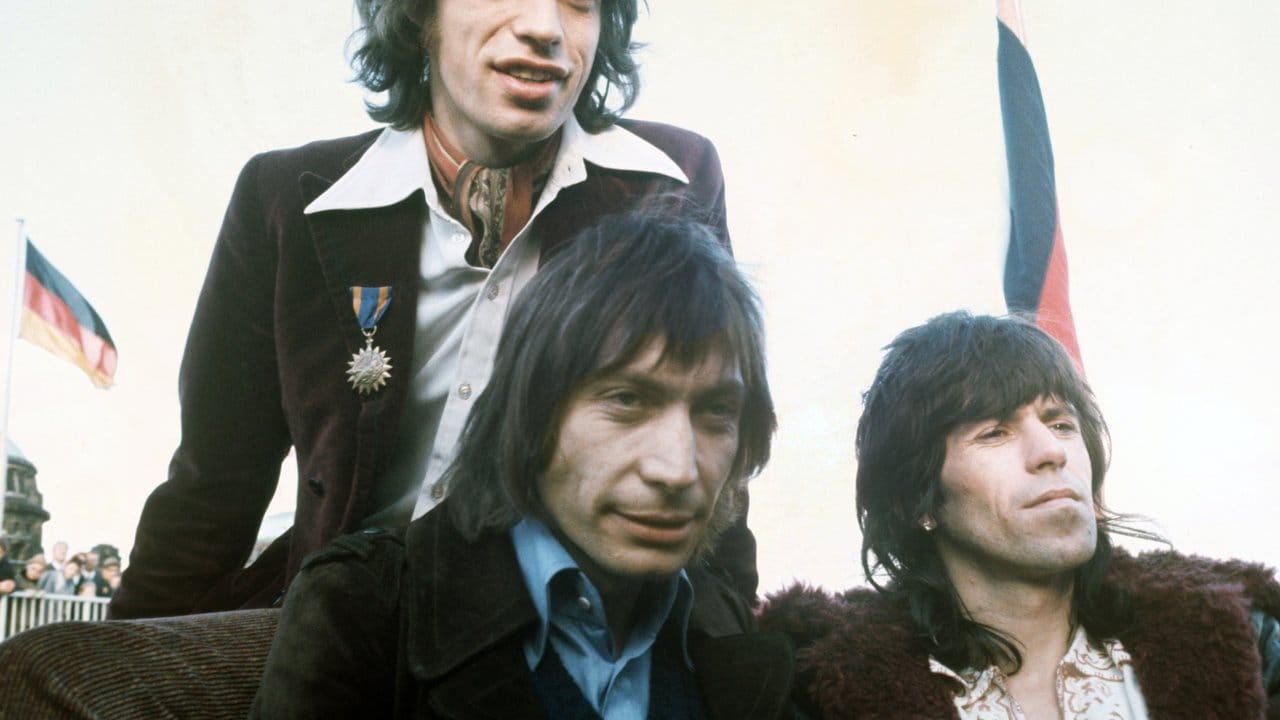 Wilde Jungs: Mick Jagger (l-r), Charlie Watts und Keith Richards 1970 bei einer Pressekonferenz.