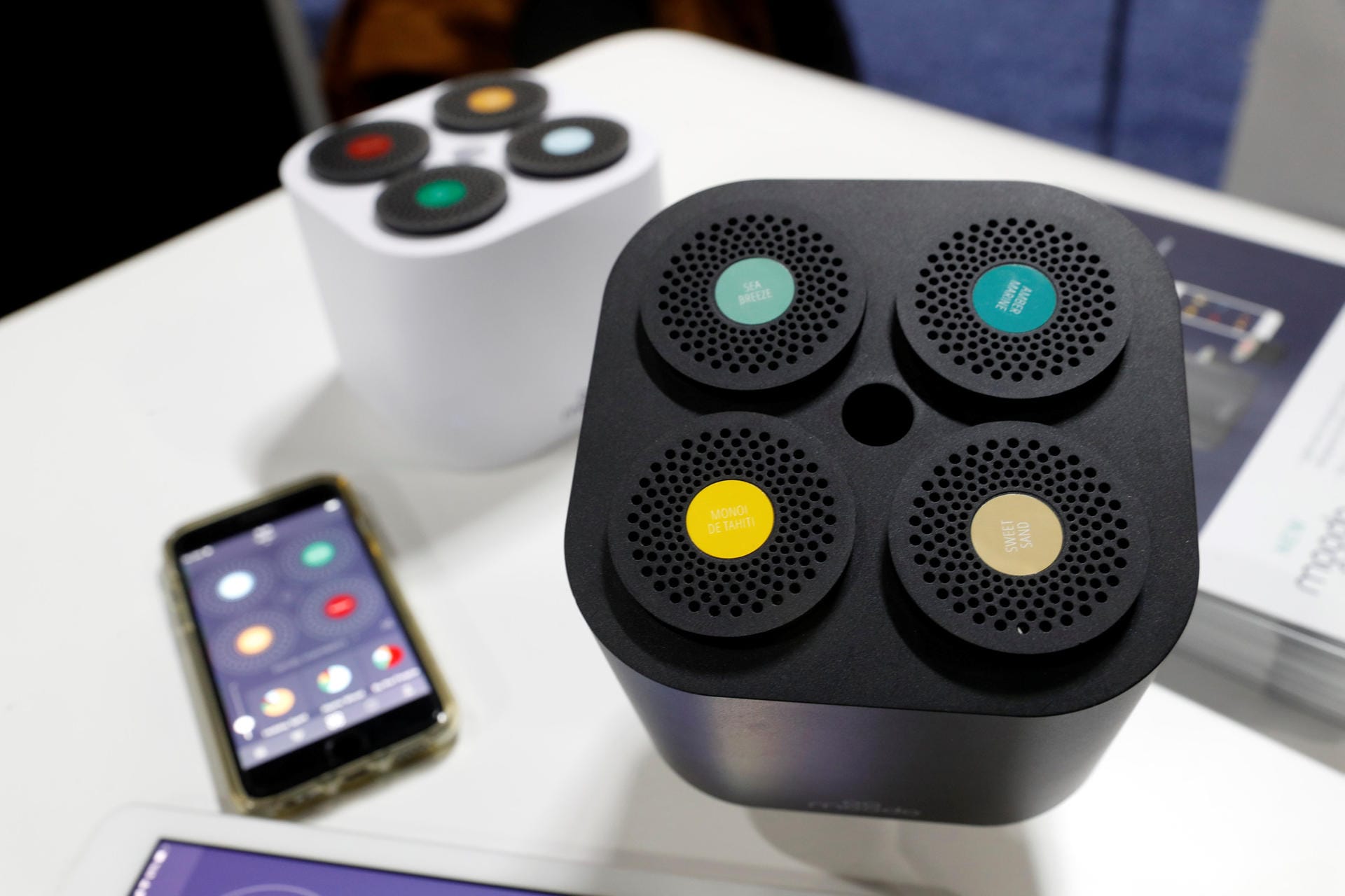 Moodo smart-home fragrance diffusers, which can mix custom aromas via a smartphone app, are displayed at "CES Unveiled" during the 2019 CES in Las Vegas