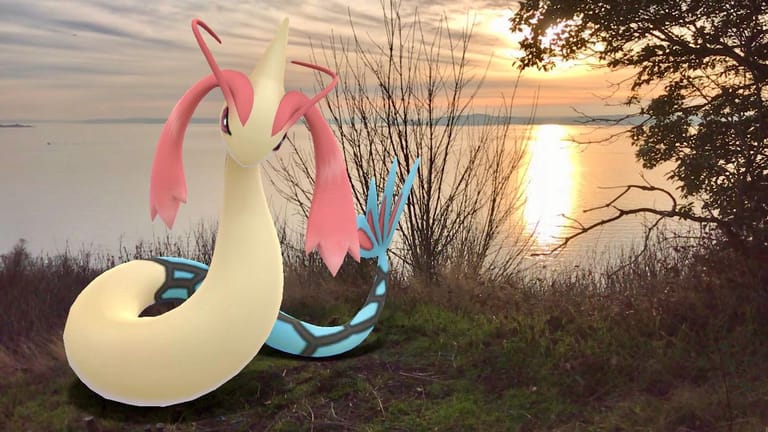 "Pokémon Go"-Spieler dürfen sich bald über eine neue Funktion freuen: "Go Snapshot". Mit dem Feature können Spieler ihre Pokémon in der echten Welt fotografieren. Dieses Promotion-Foto von Entwickler Niantec zeigt ein Milotic vor einem Sonnenuntergang.