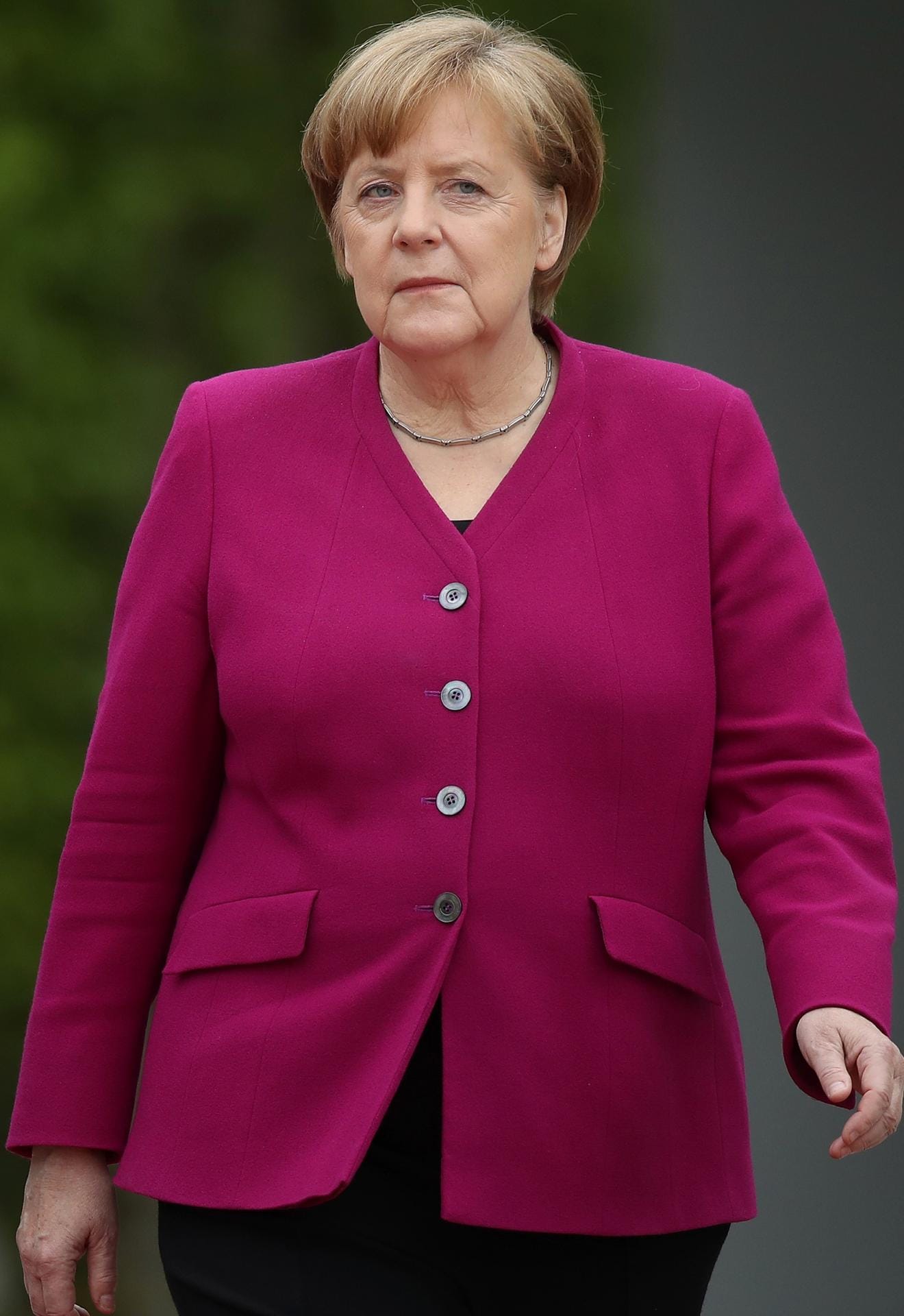 Angela Merkel in Fuchsia.