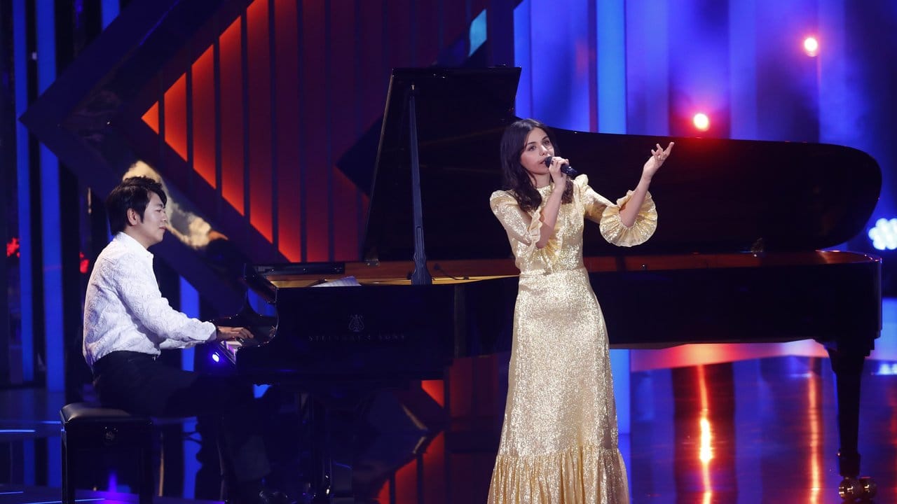 Lang Lang und Katie Melua spielen "What A Wonderful World". Lang Lang und Katie Melua spielen "What A Wonderful World".