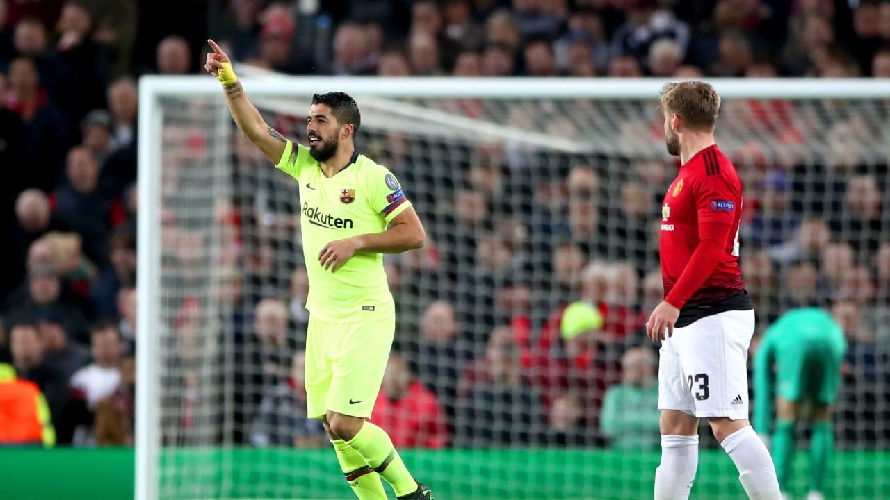 Barcas Luis Suarez feiert sein entscheidendes Tor in Manchester.