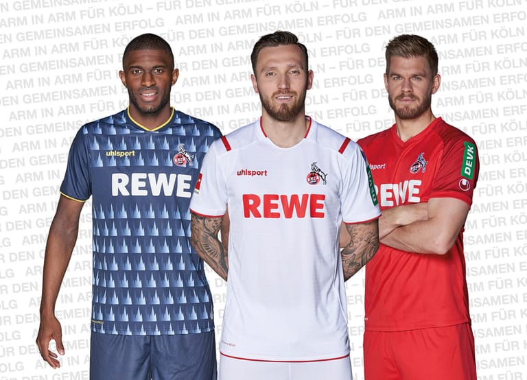 Heim- und Auwärts-Trikot des 1. FC Köln bleiben schlicht in Weiß und Rot. Besonderer Hingucker ist hingegen das dunkelblaue Ausweichdress mit der Silhouette des Kölner Doms.