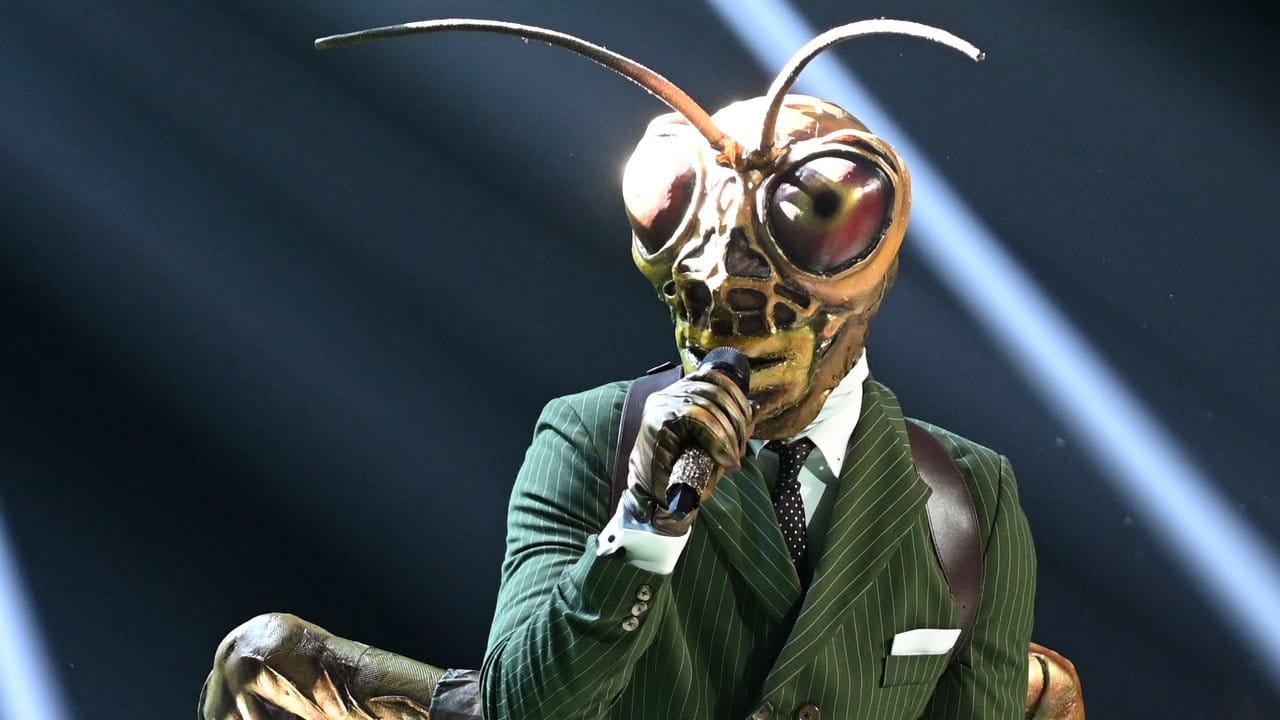 Der Grashüpfer in der ProSieben-Show "The Masked Singer". Der Grashüpfer in der ProSieben-Show "The Masked Singer".