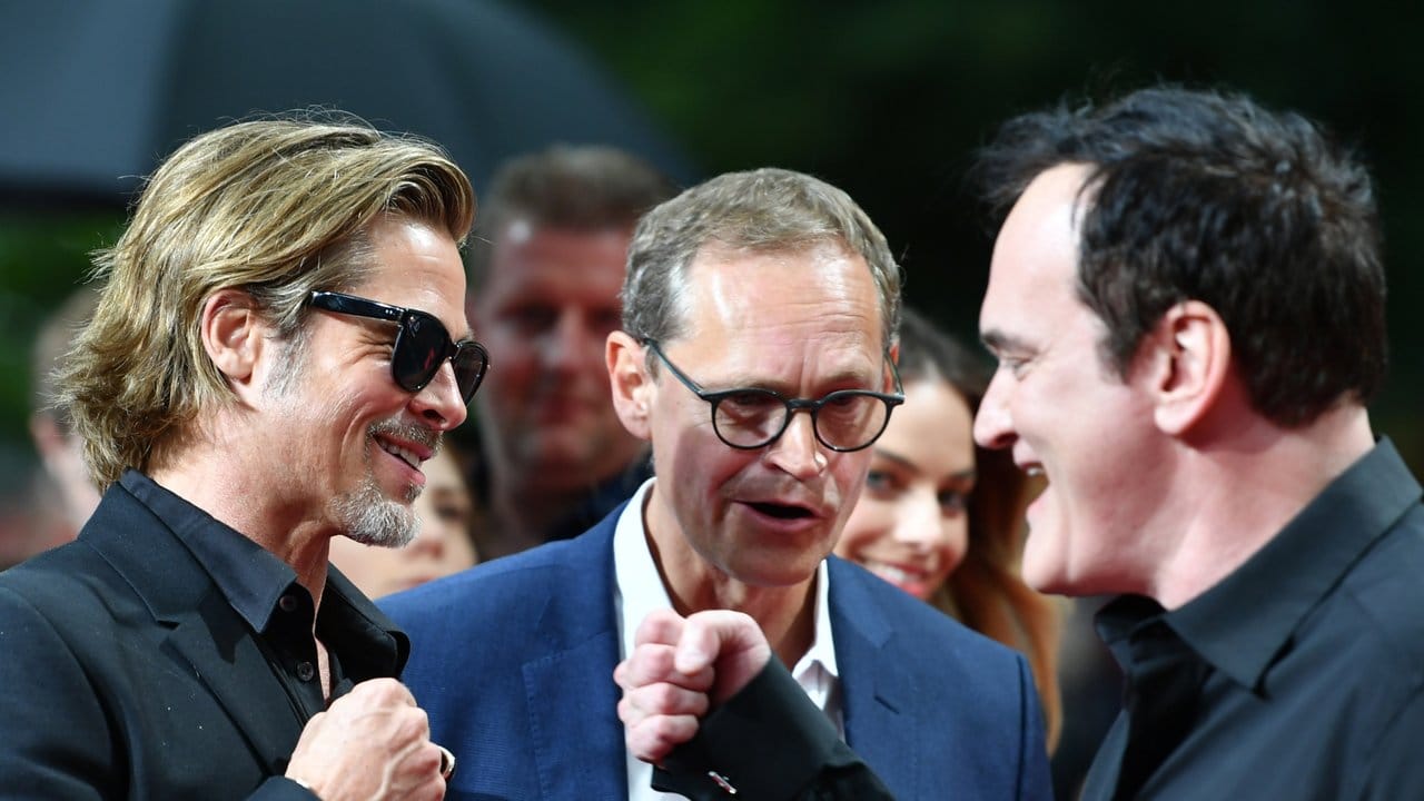 Berlins Regierender Bürgermeister Michael Müller und zwei Weltstars: Brad Pitt und Quentin Tarantino.