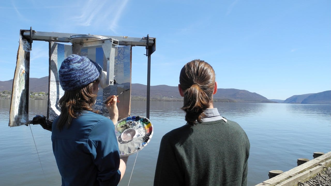 Die Oakes-Zwillinge Ryan (r) und Trevor arbeiten vor ihrem Atelier am Hudson River an einem Ölgemälde.