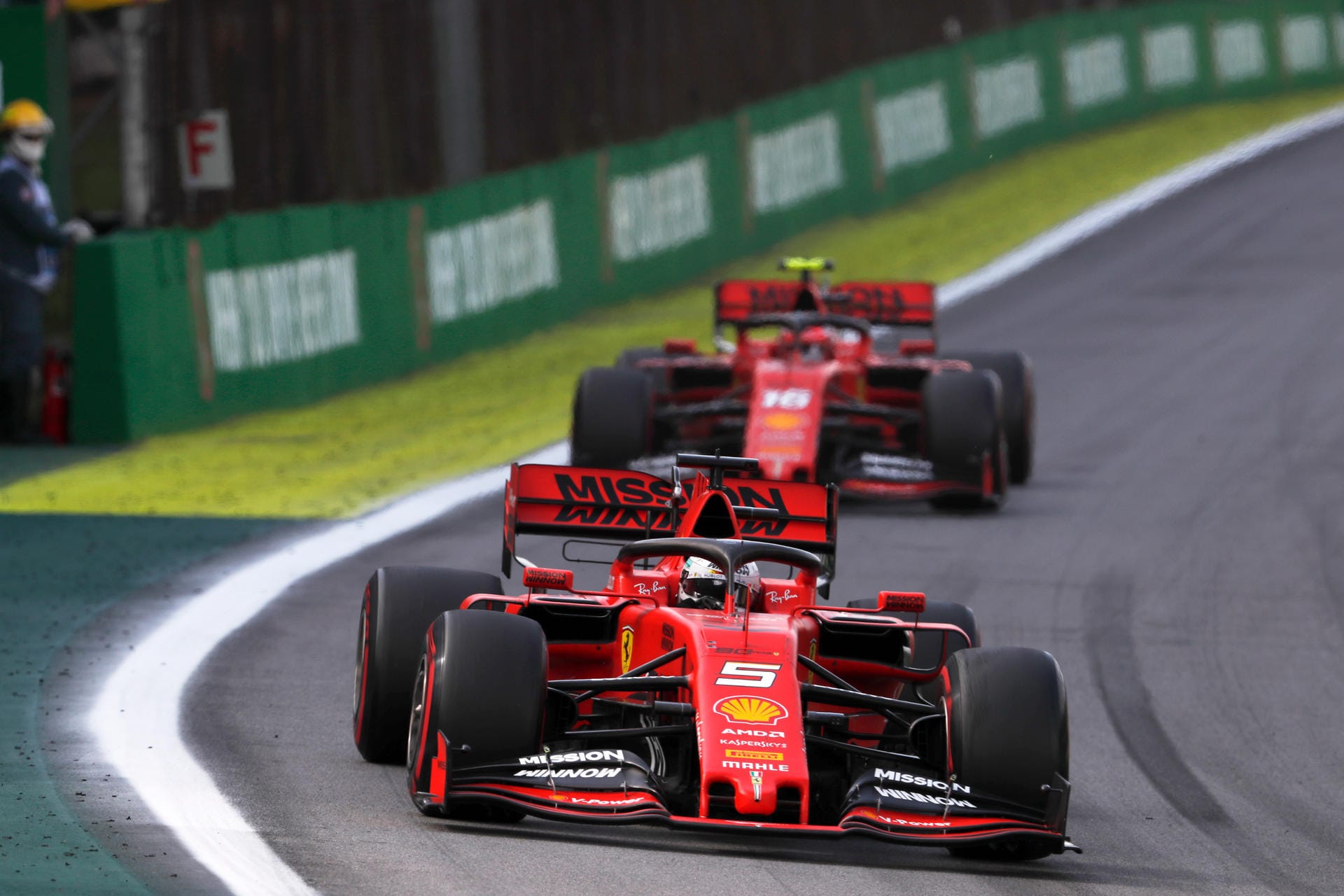 2019 Brazilian GP SAO PAULO, BRAZIL - NOVEMBER 17: Sebastian Vettel, Ferrari SF90, leads Charles Leclerc, Ferrari SF90 d