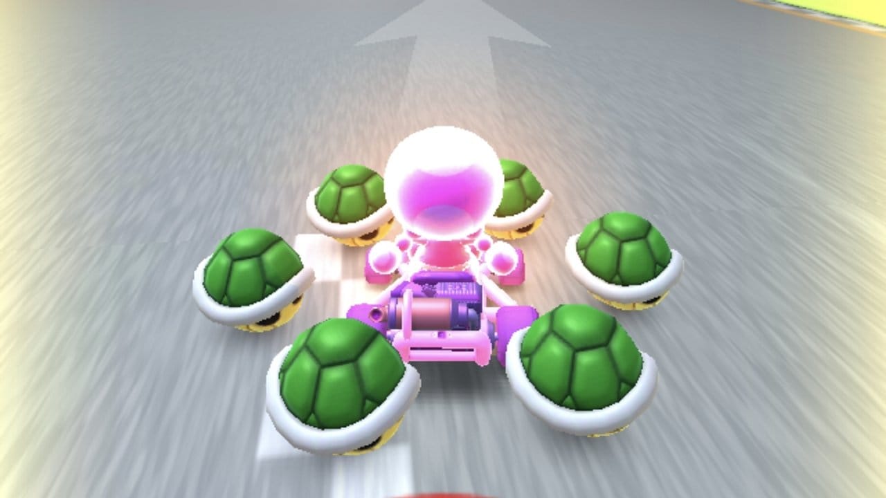 Mit den Schildkrötenpanzer kann Toadette ihre Gegner von der Fahrbahn schubsen.